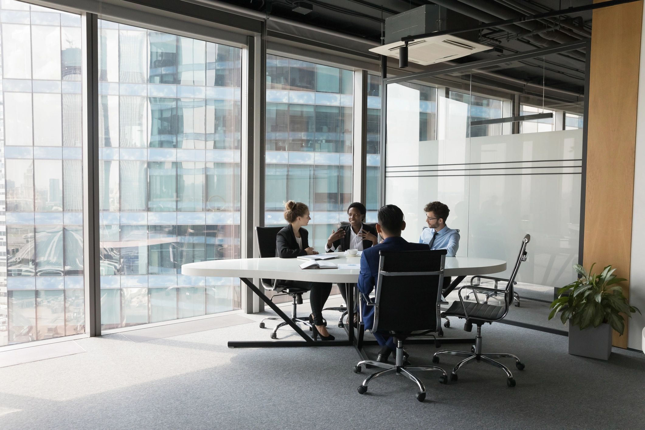 Business team collaborating in a modern meeting room